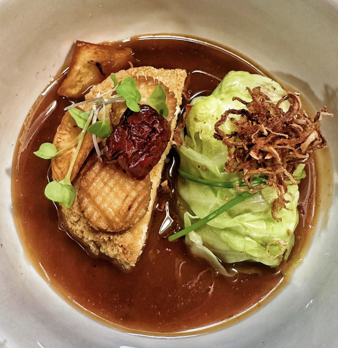 Bhudda's Rest, vegan Buddha jumps over the wall